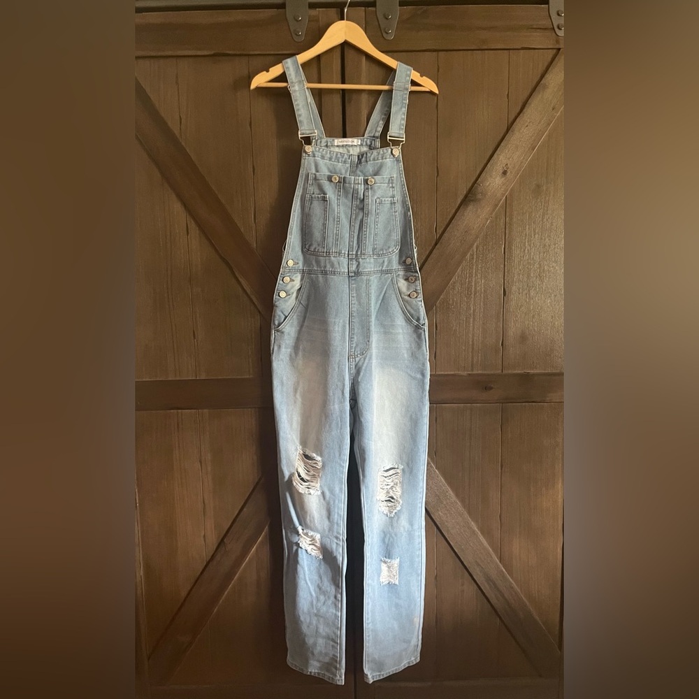 Women’s vintage Light Blue Distressed Denim Overalls